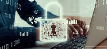 Businessman uses capable laptop computer to manage cyber security system